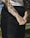 Close-up of a person showing a fresh tattoo on their forearm.