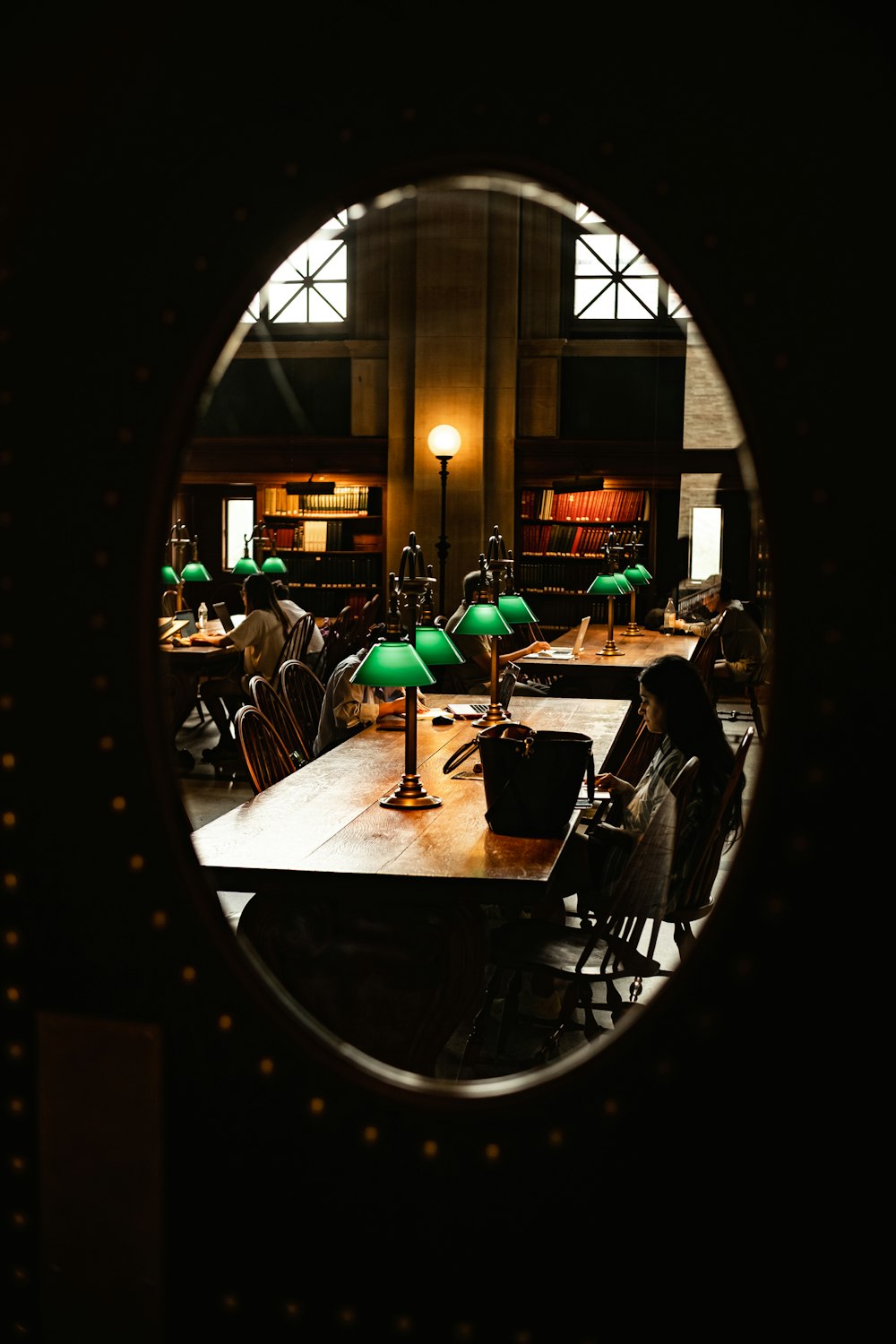 a view of a table through a hole in a wall