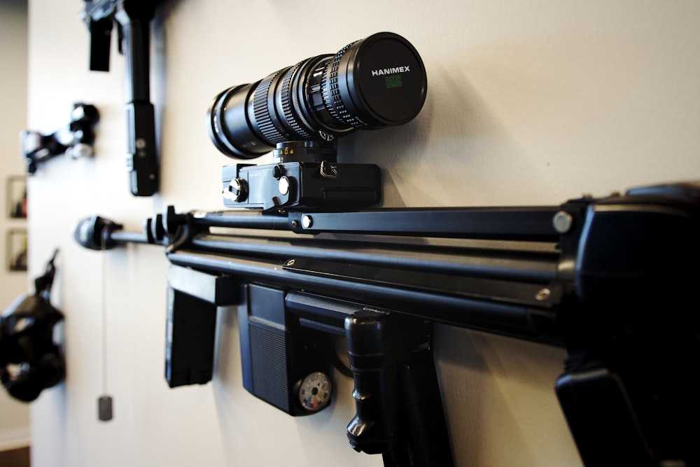 a camera mounted to a wall next to a camera