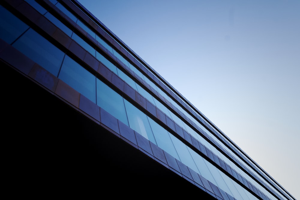 a very tall building with a sky in the background