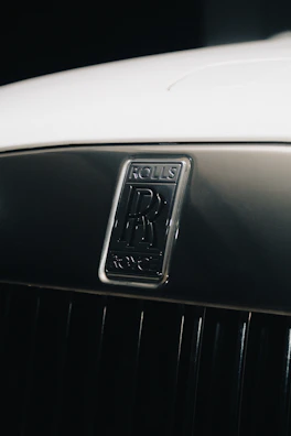 Rolls Royce branded European auto spare parts arranged neatly with a hint of gold trim.