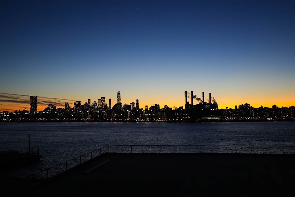 a view of a city skyline at sunset