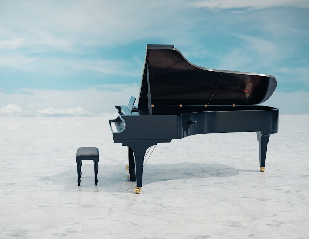 Un piano negro sentado encima de un suelo blanco