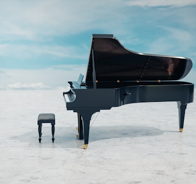 a black piano sitting on top of a white floor