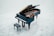 A grand piano with its lid open, showcasing the strings and internal components, placed on a light grey marble floor. There is a matching piano bench positioned in front of the piano.