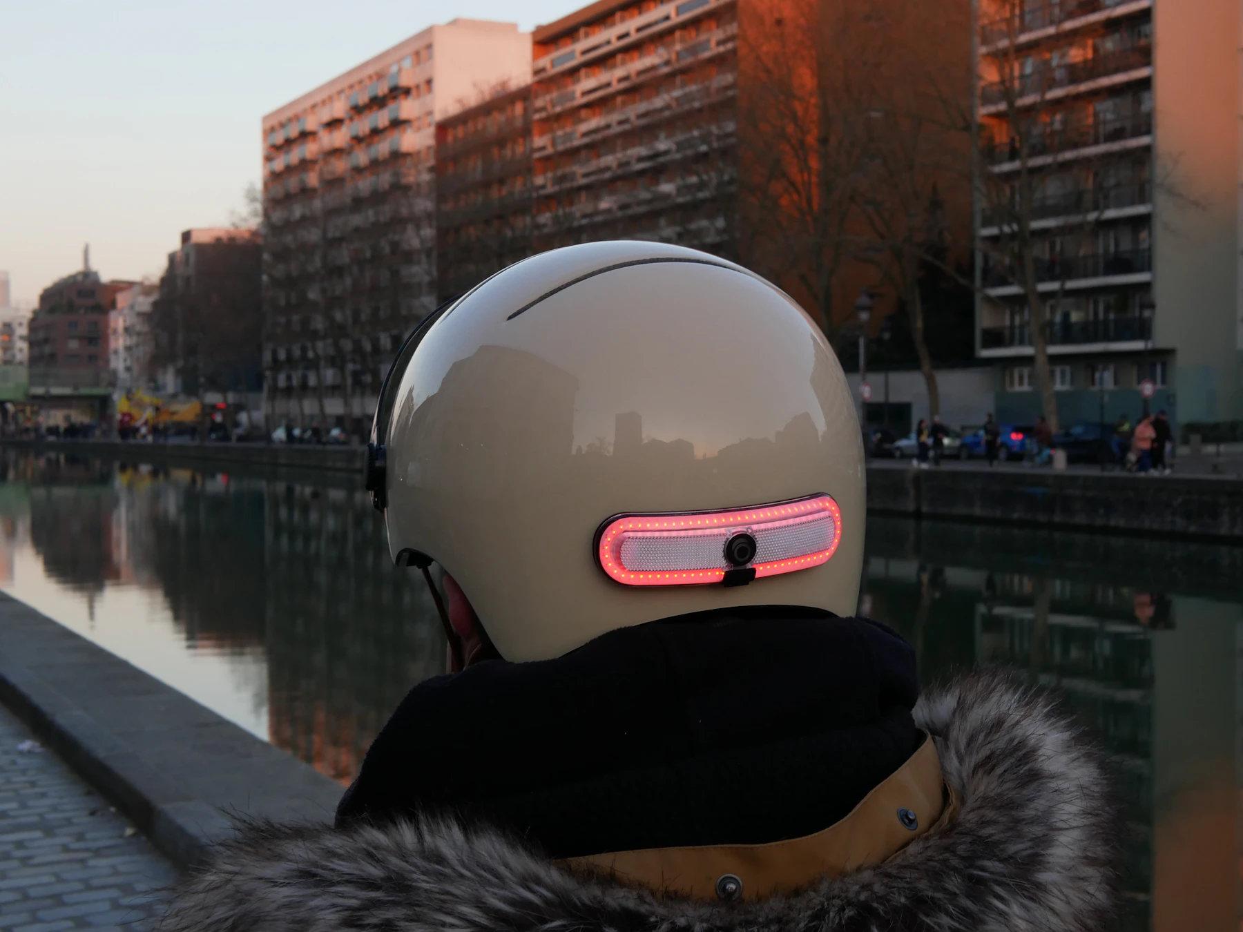 Illuminated visibility light attached to cycling safety equipment