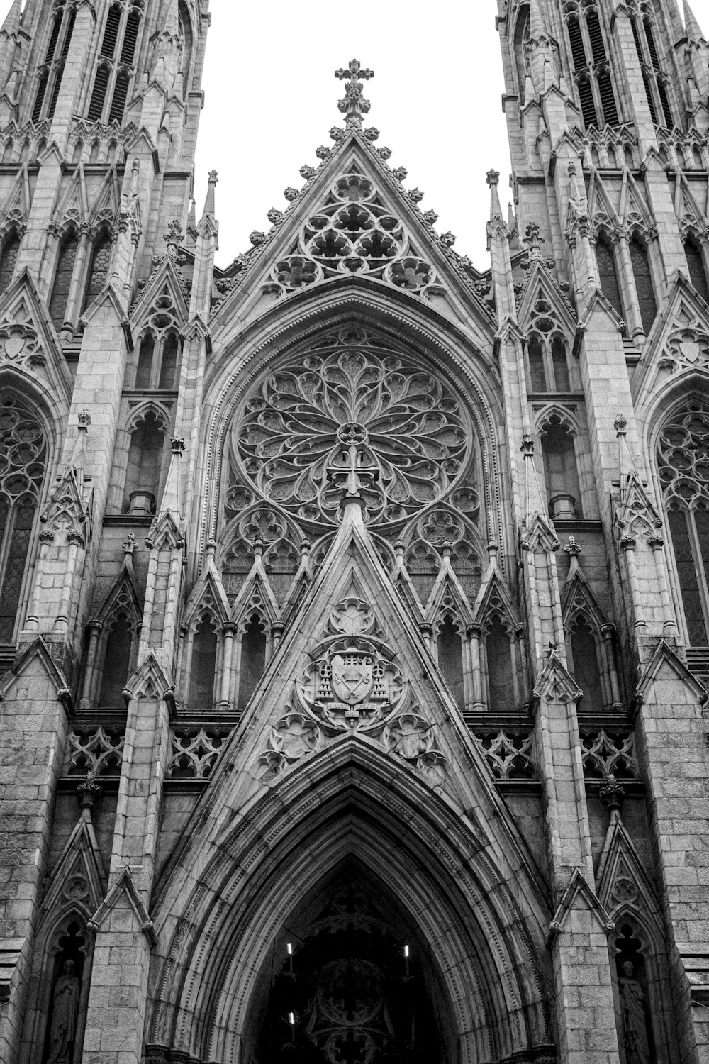 a black and white photo of a large cathedral