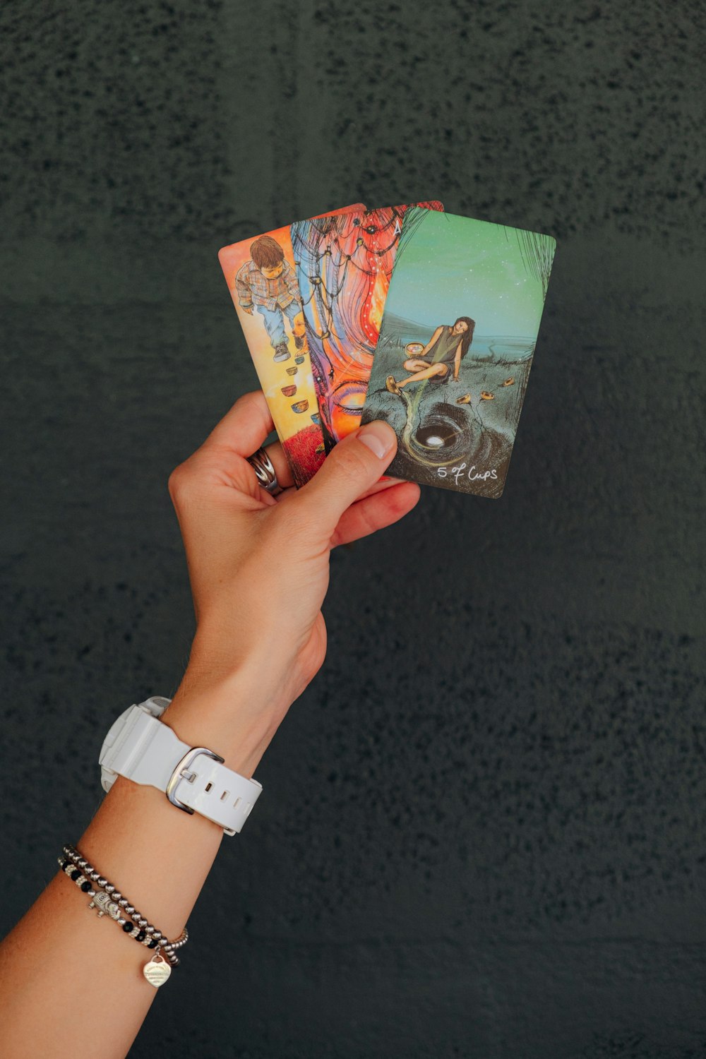 a person holding a card in their hand