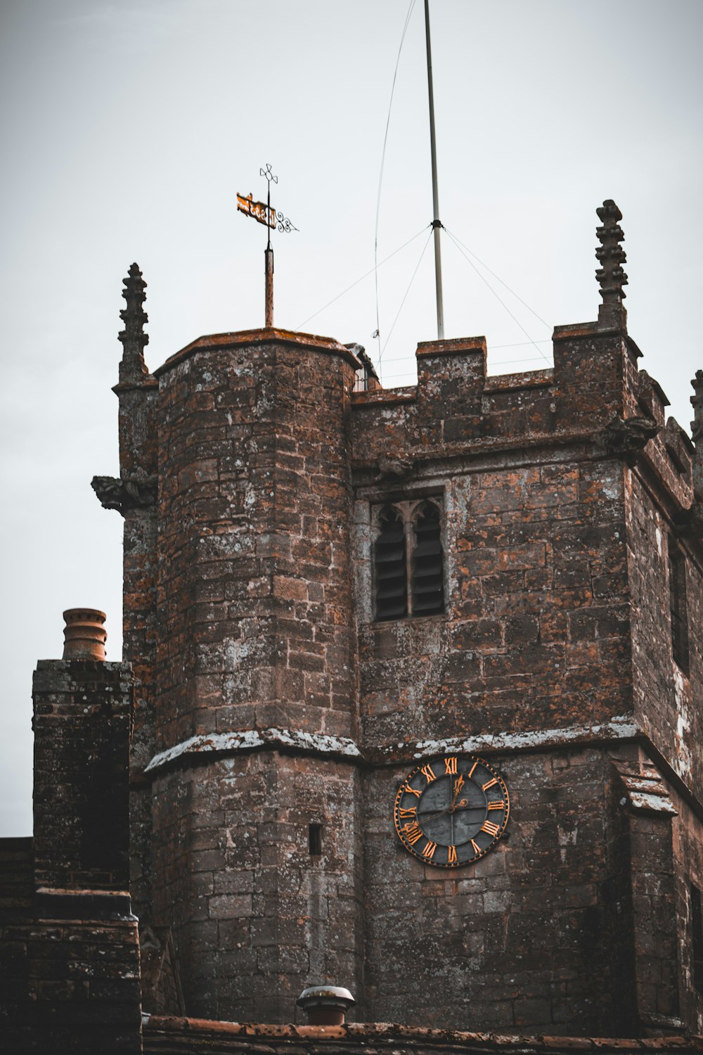 a large brick building with a clock on it