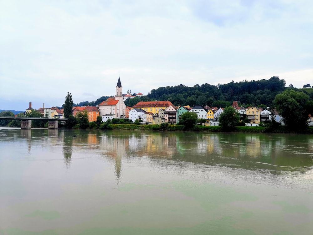 a river that has some buildings on it