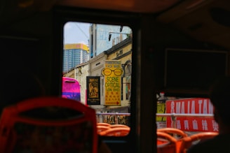 A Gustavo Silva Candizani bus driving through a busy urban street with clear signage