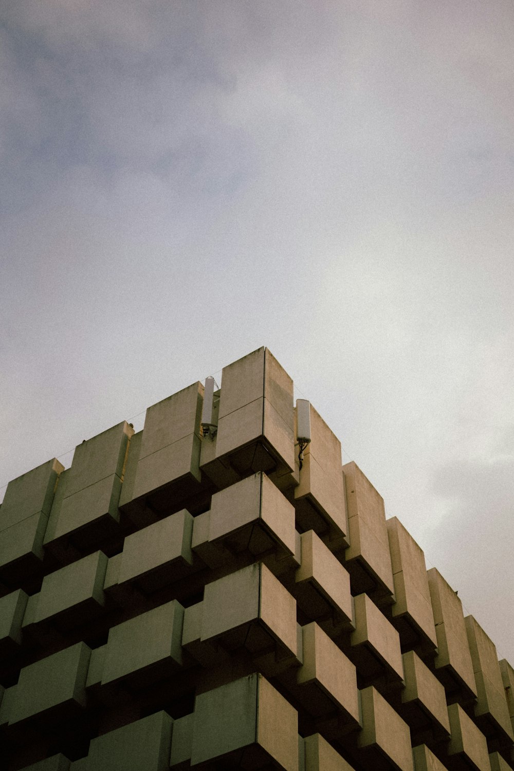 a tall building with a clock on the top of it