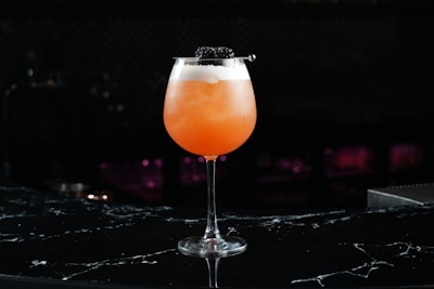 A vibrant cocktail served at Bellini Bliss café.