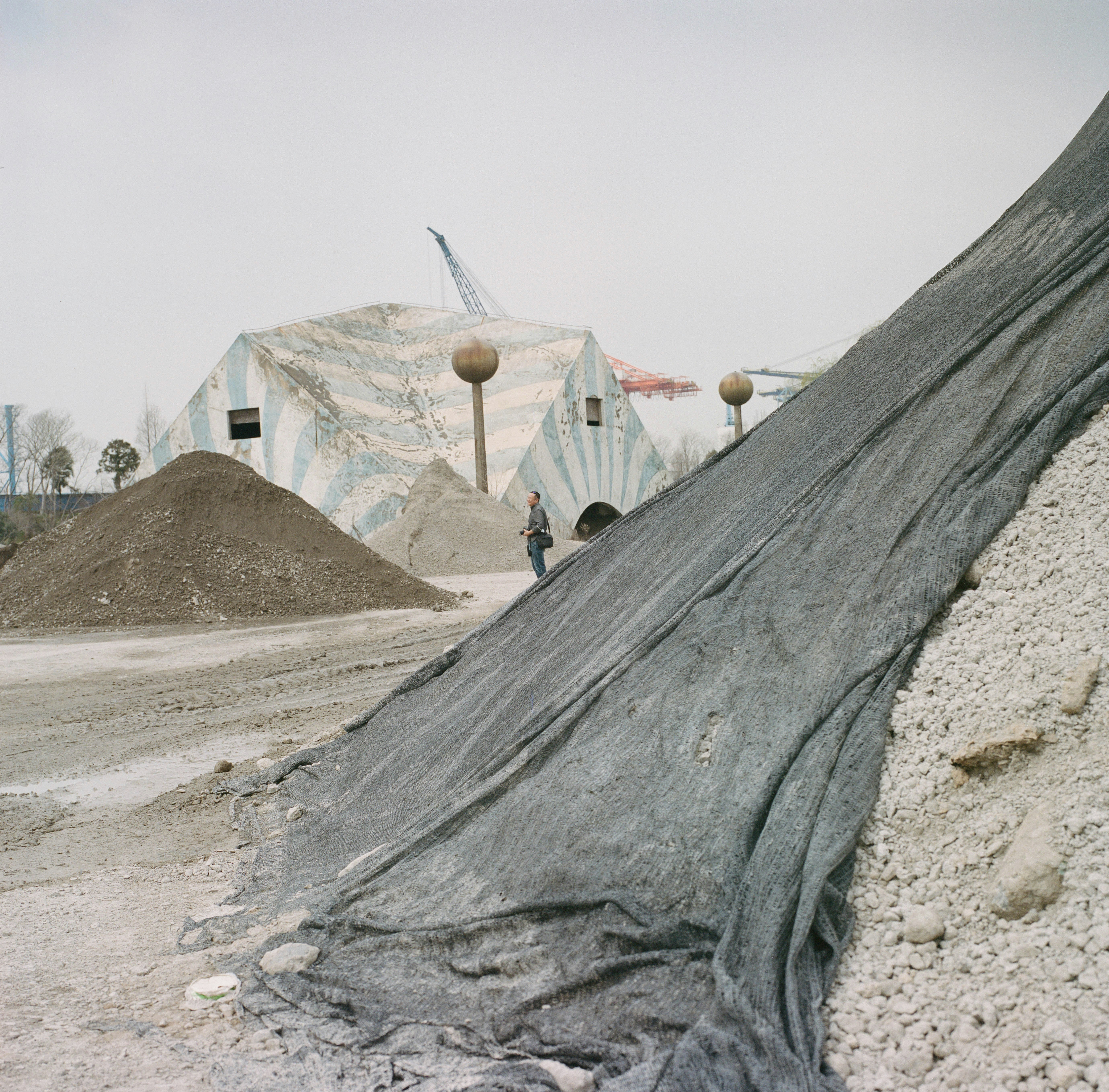 a pile of dirt sitting next to a pile of dirt