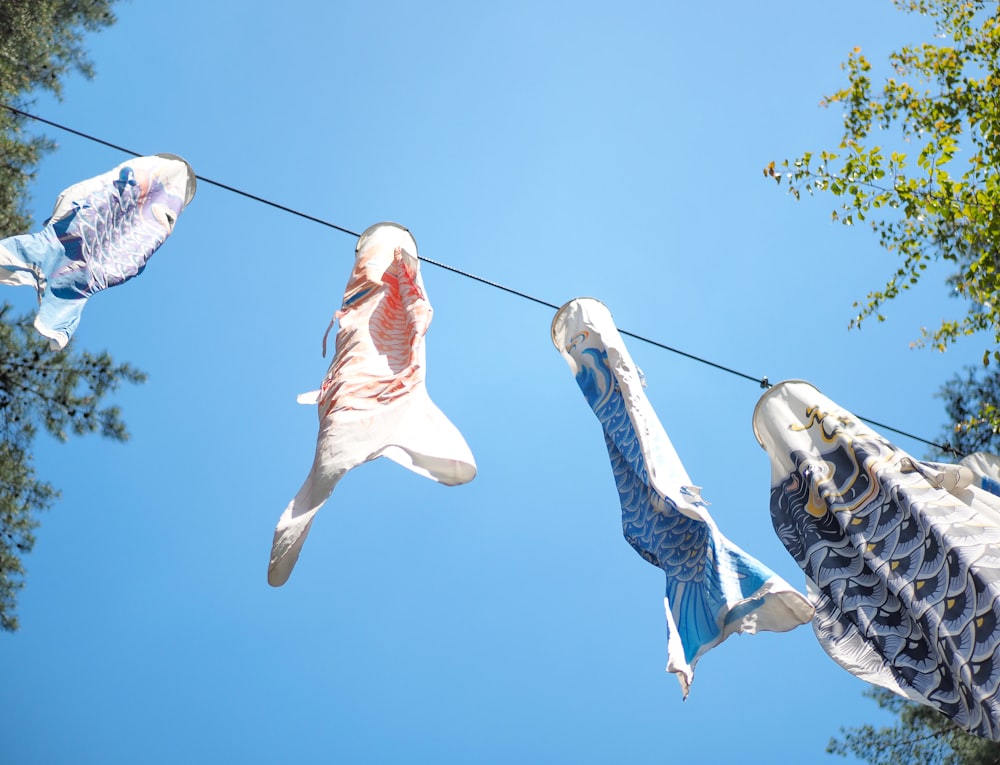 a string of cloths hanging from a clothes line