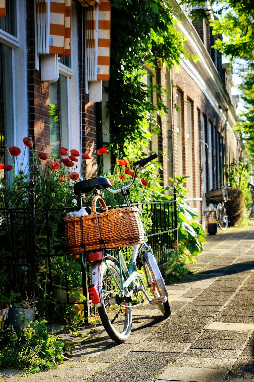 a bicycle parked on the side of a street