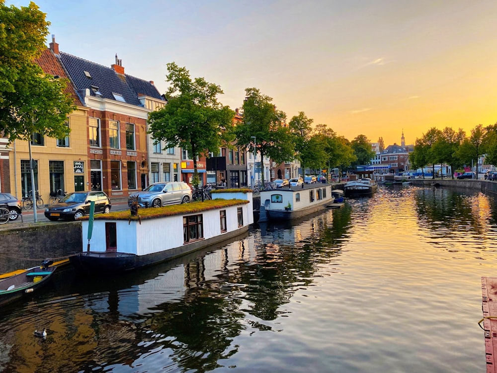 a boat is parked on the side of a river