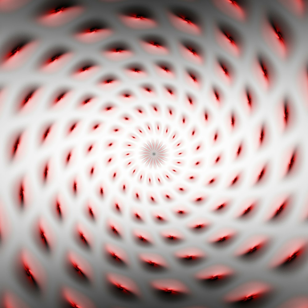 a red and white spiral design with a black background