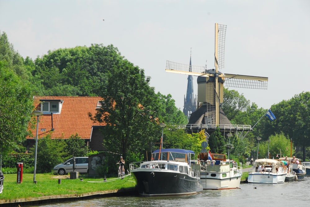 a group of boats that are sitting in the water