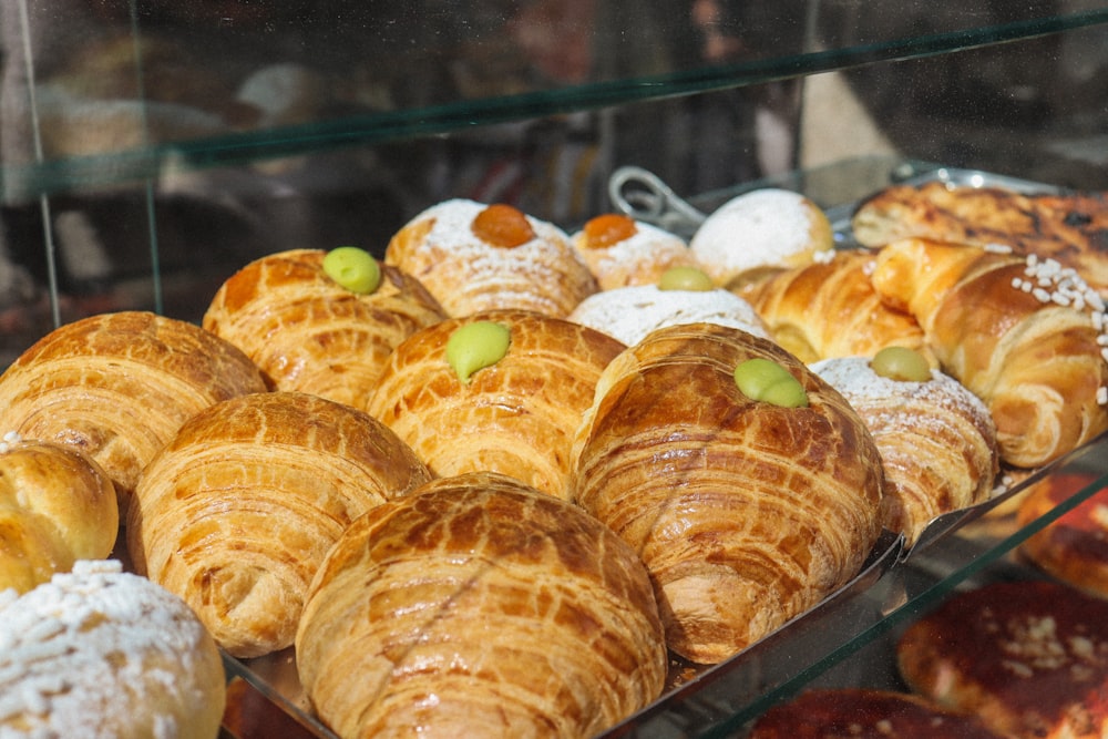 a display case filled with lots of different types of pastries
