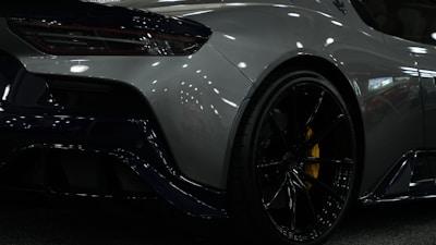 The rear view of a sporty coupe showcasing its design.