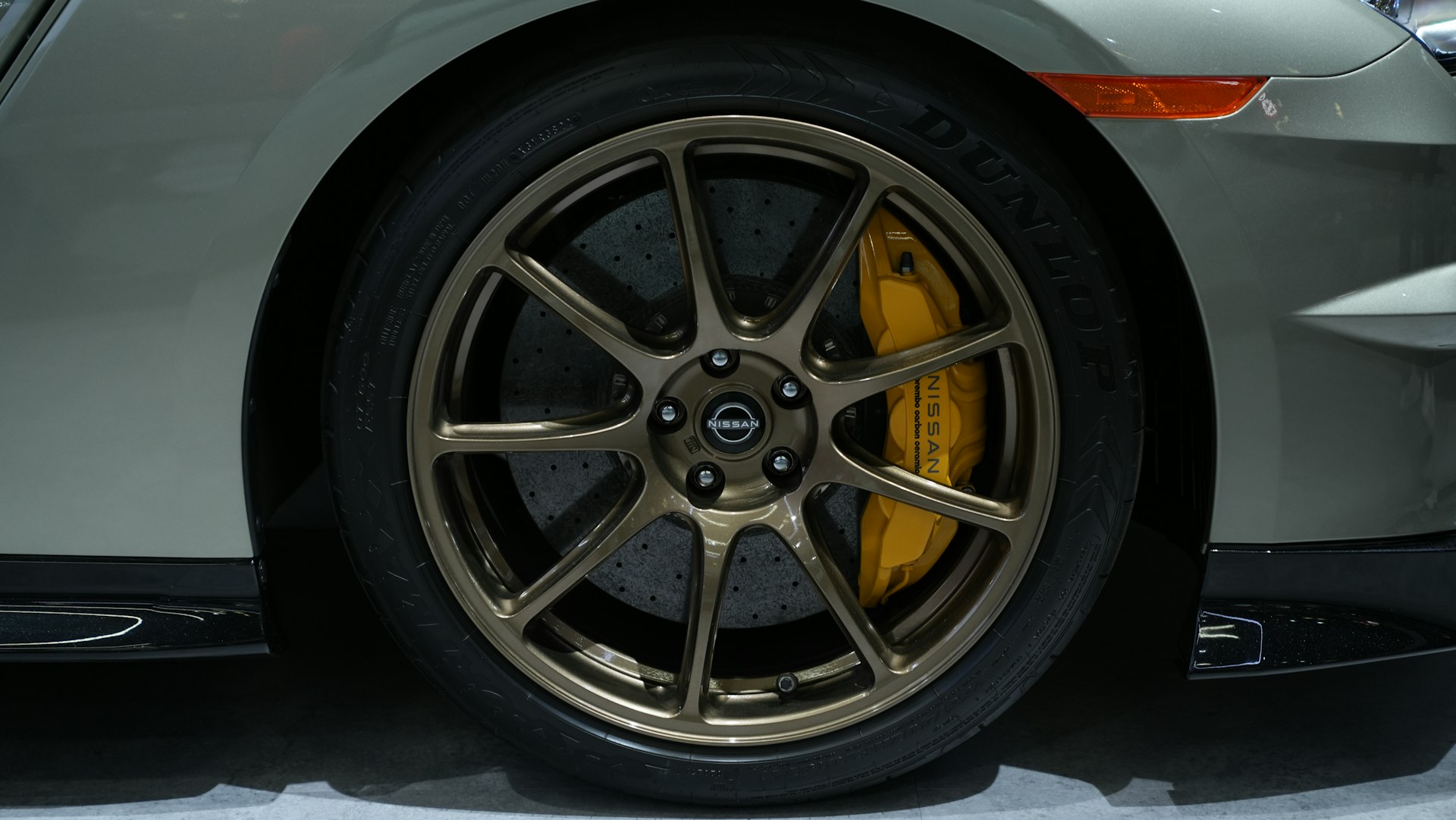 woman wearing yellow long-sleeved dress under white clouds and blue sky during daytime
