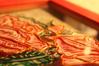 Close-up of a custom-printed glass with a delicate floral design