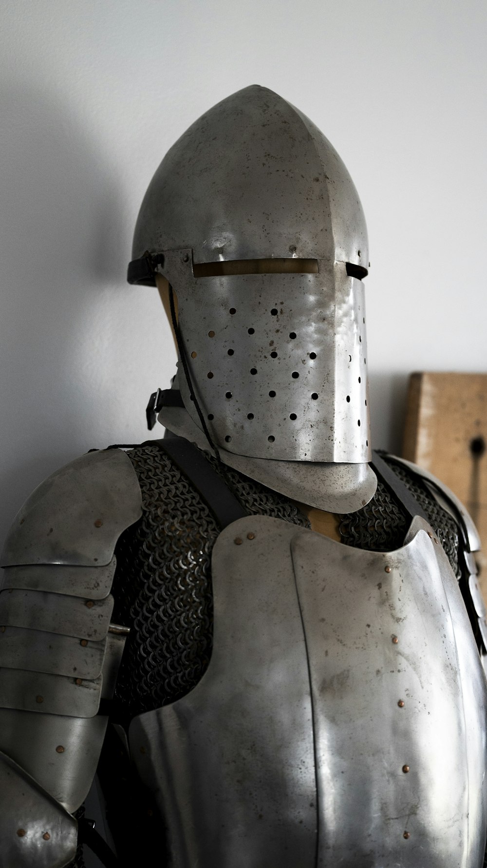 a close up of a person in a suit of armor