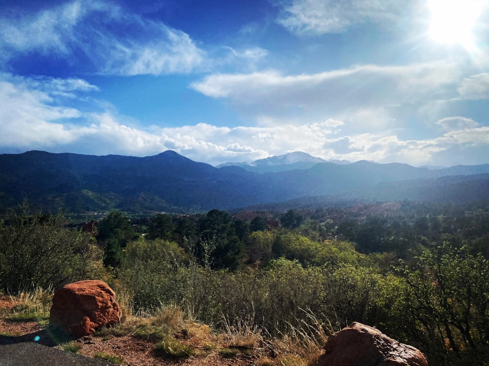 a view of a mountain range from a road