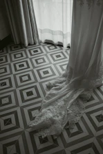 Elegant bridal gown displayed in soft natural light