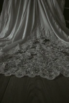 Artistic shot of delicate fabric textures and sewing details in lingerie