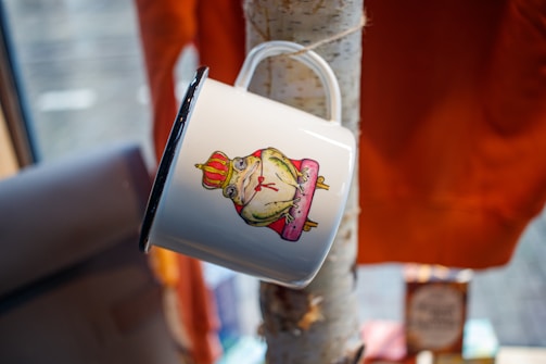 A charming mug adorned with whimsical illustrations.