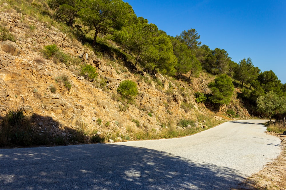 a road with a steep hill on the side of it