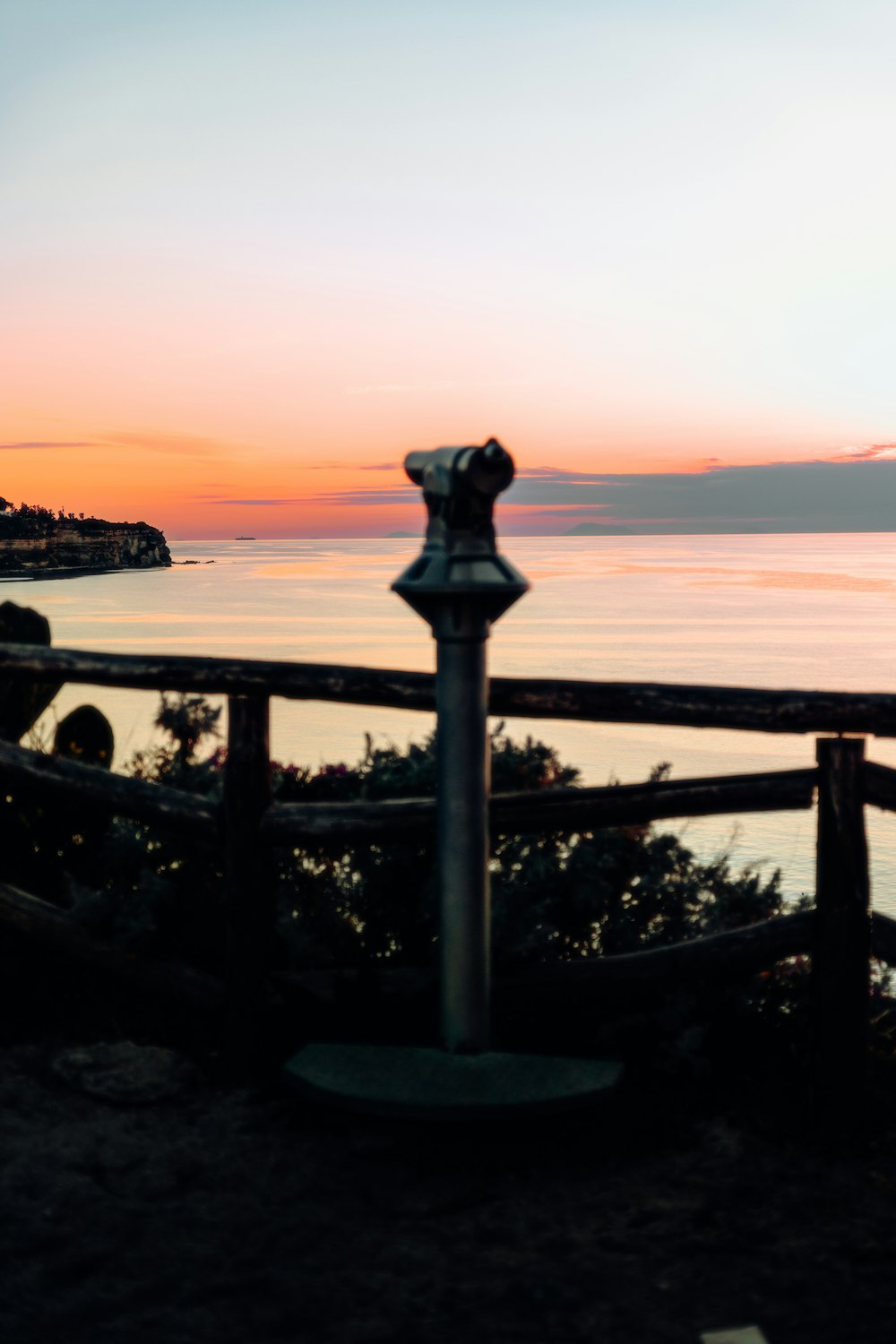 a view of a body of water at sunset