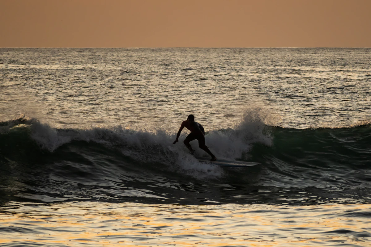 Sunset surfing in Nosara, Costa Rica