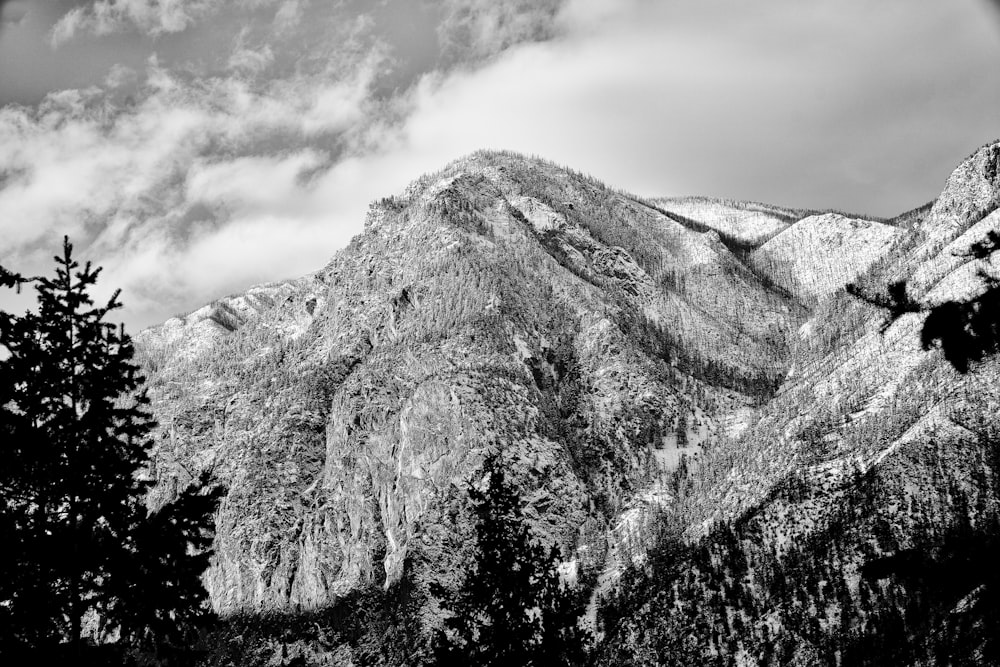 a black and white photo of a mountain