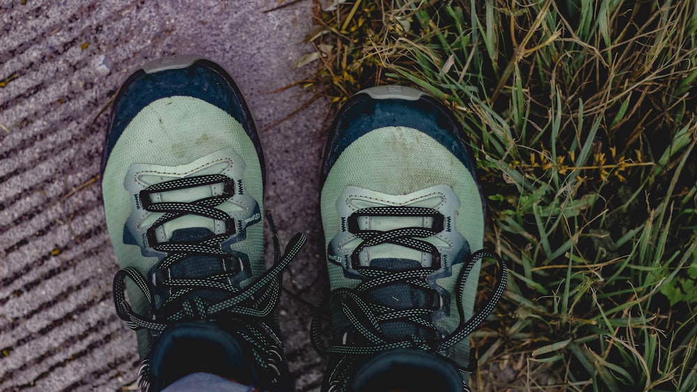 a person's feet in a pair of hiking shoes