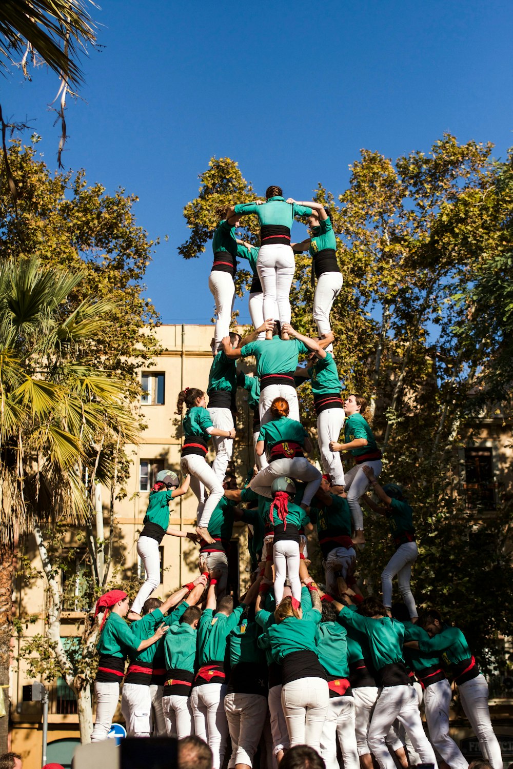 a group of people standing on top of each other