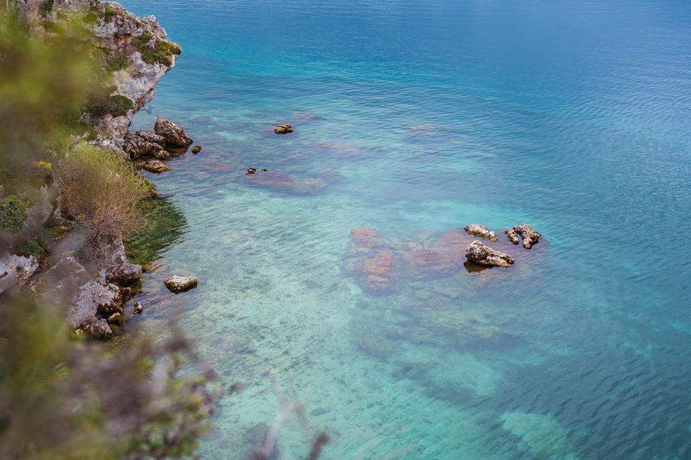 a body of water that has some rocks in it