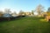 A clean, organized backyard after professional junk removal and landscaping work.
