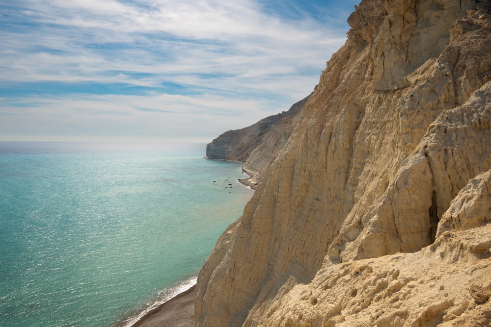 a view of the ocean from the top of a cliff