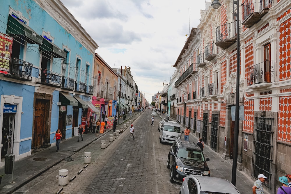 a street with cars parked on both sides of it