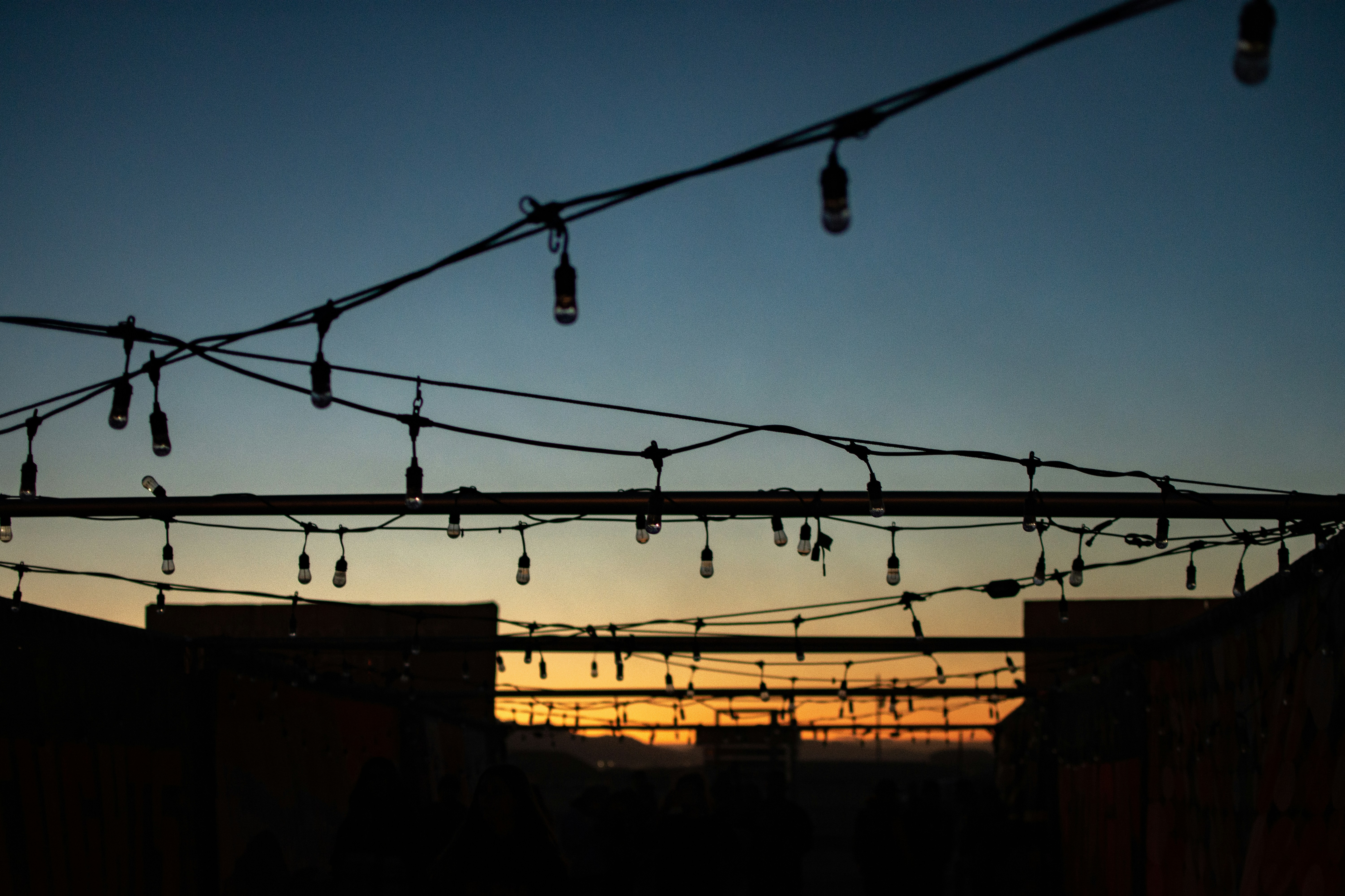 a string of lights hanging from a roof