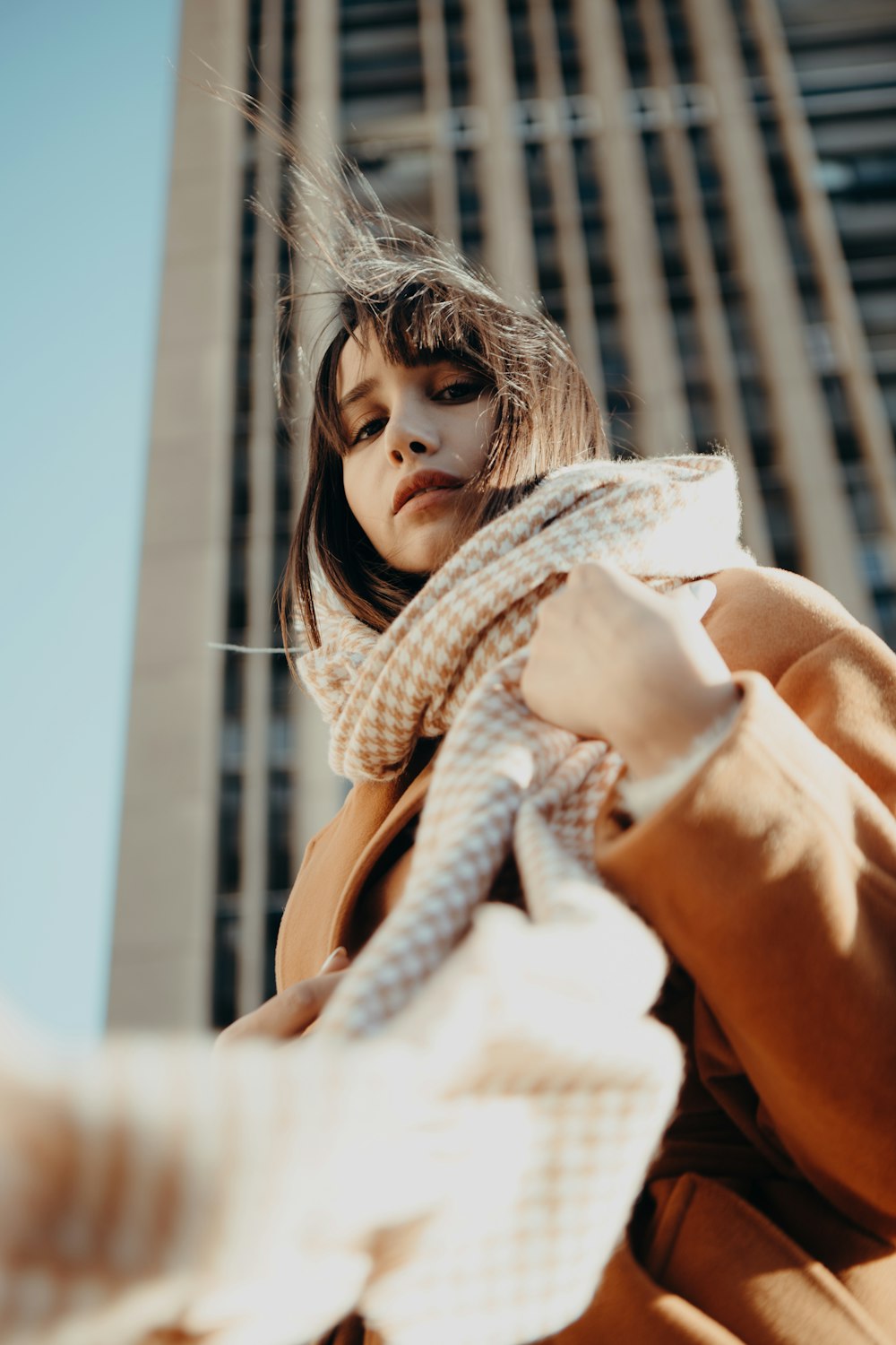 a woman with a scarf around her neck