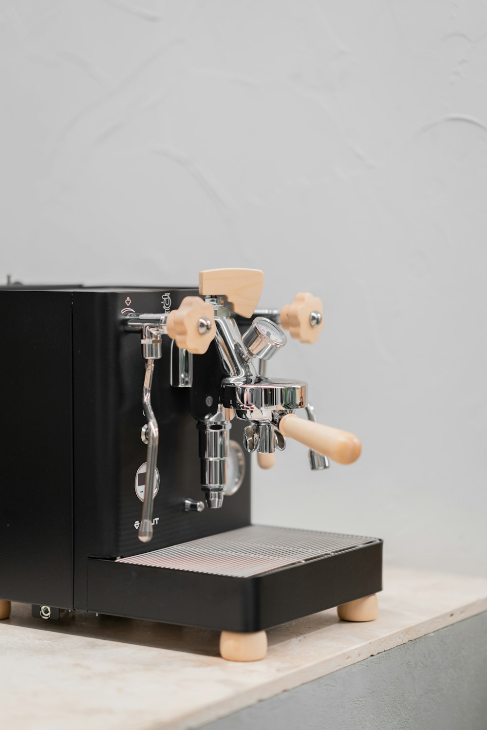 an espresso machine sitting on top of a counter