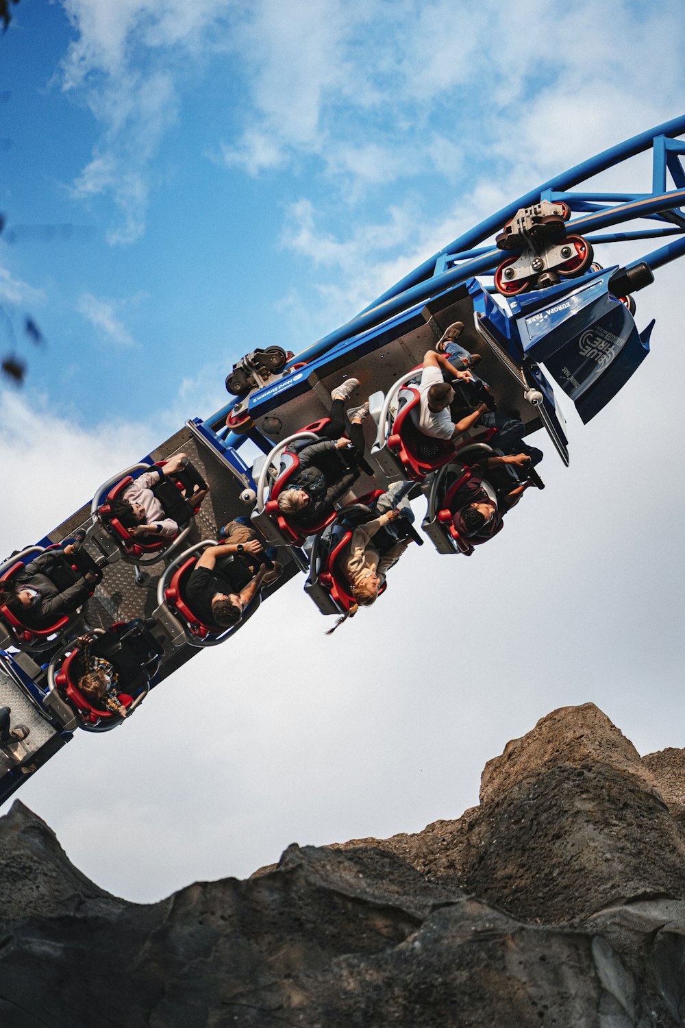 a roller coaster with people riding on it