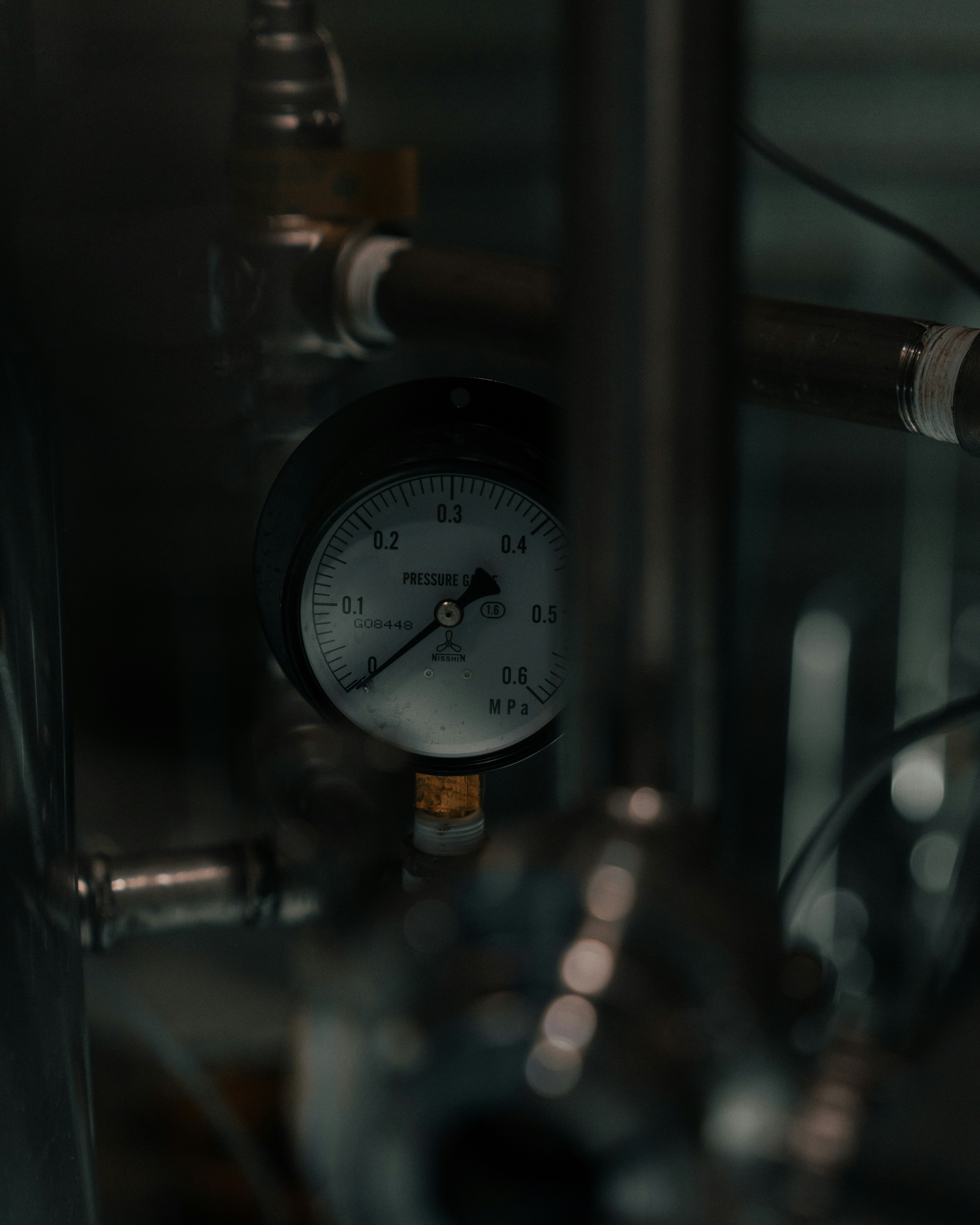 a close up of a pressure gauge on a machine