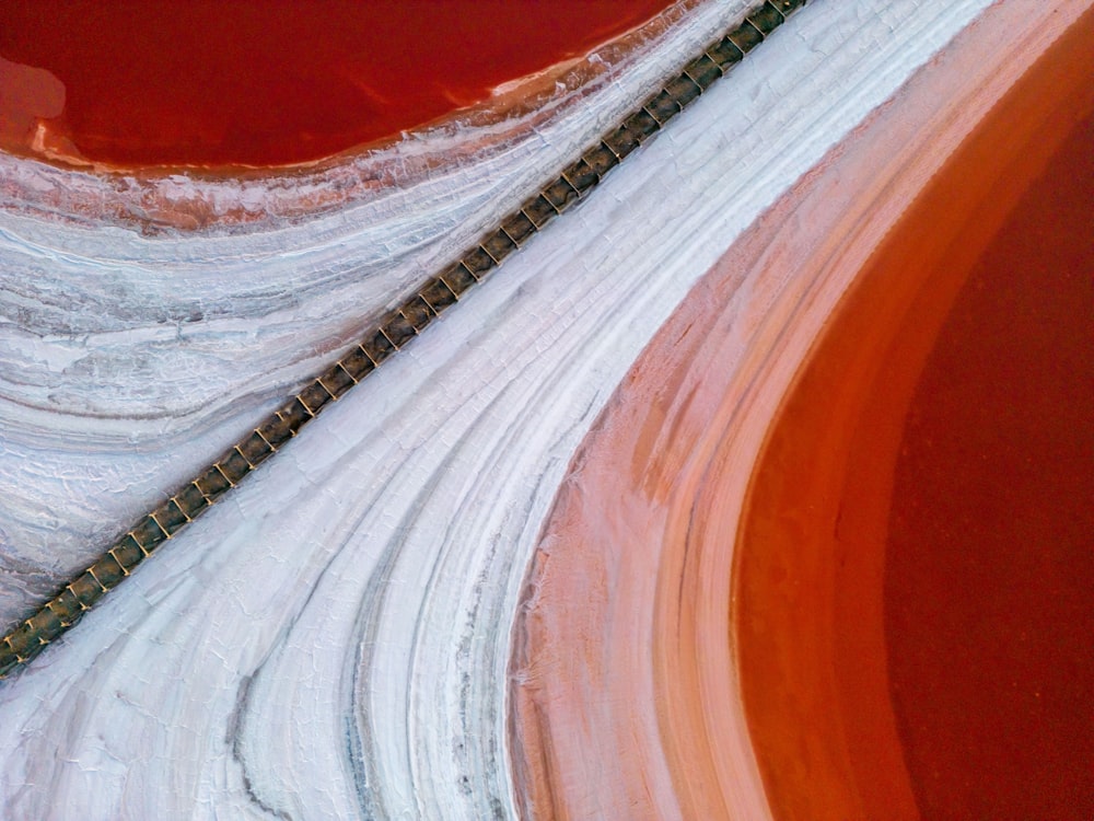 an aerial view of a red and white landscape