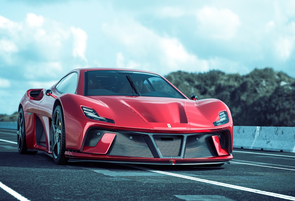 a red sports car driving down a road