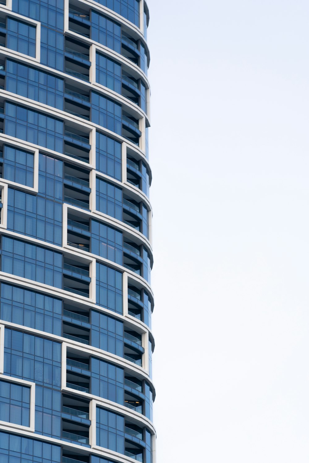 a very tall building with a clock on the side of it